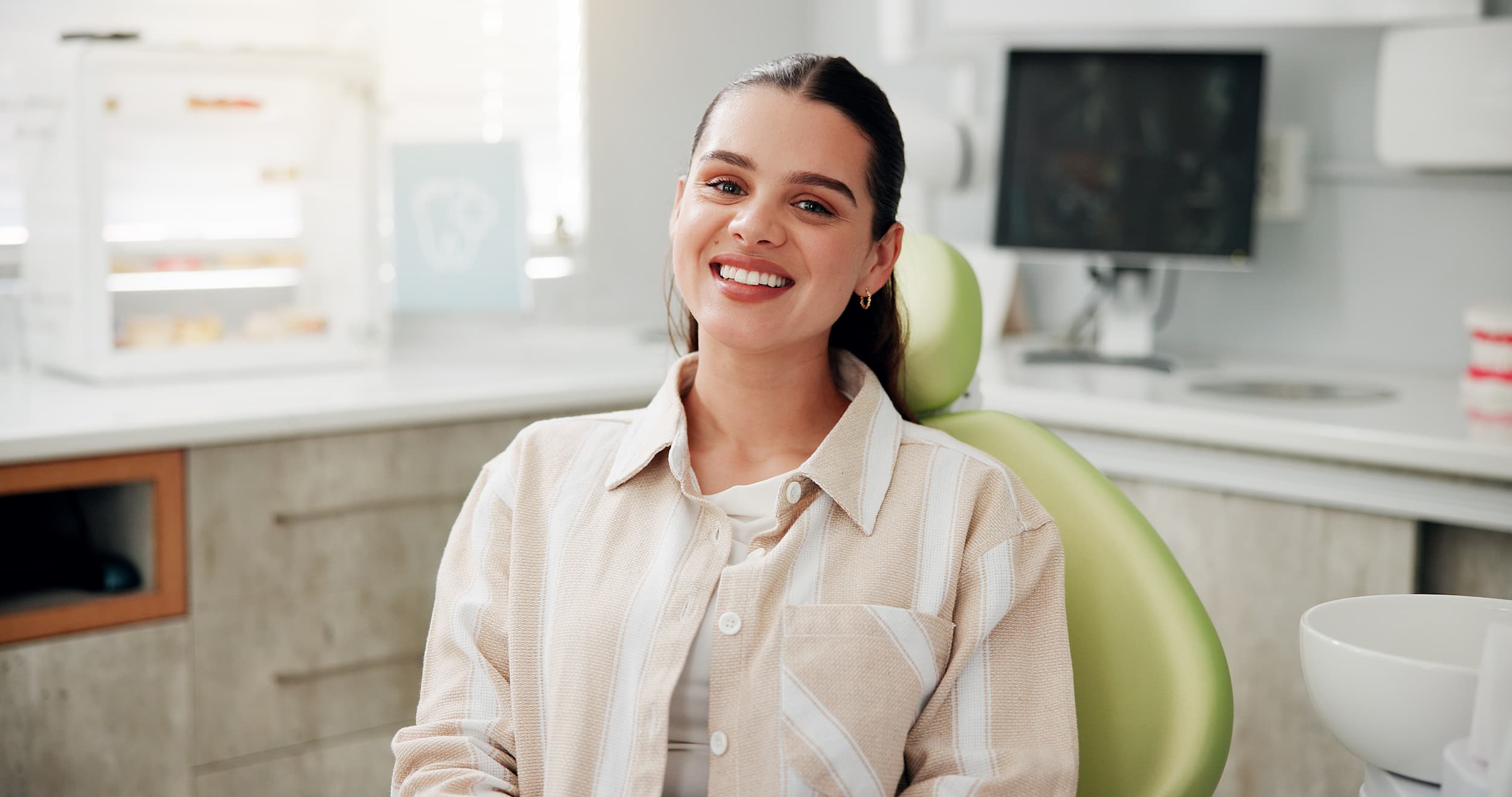 Femme chez le dentiste